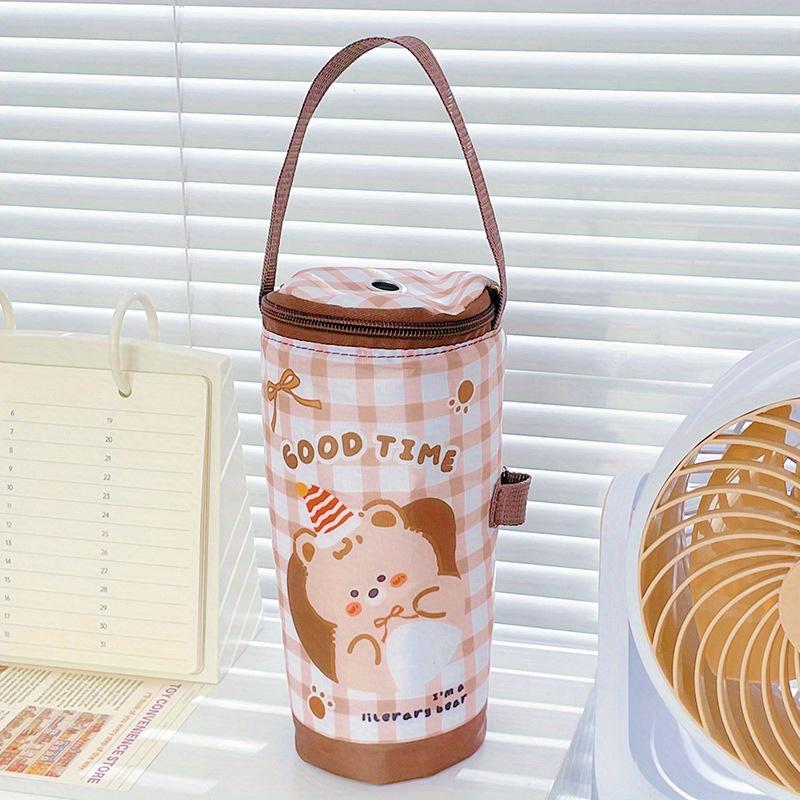 Cartoon insulated cup bag, nylon material with handle, portable for daily outdoor use.
Cartoon insulated cup bag, nylon material with handle, portable for daily outdoor use.