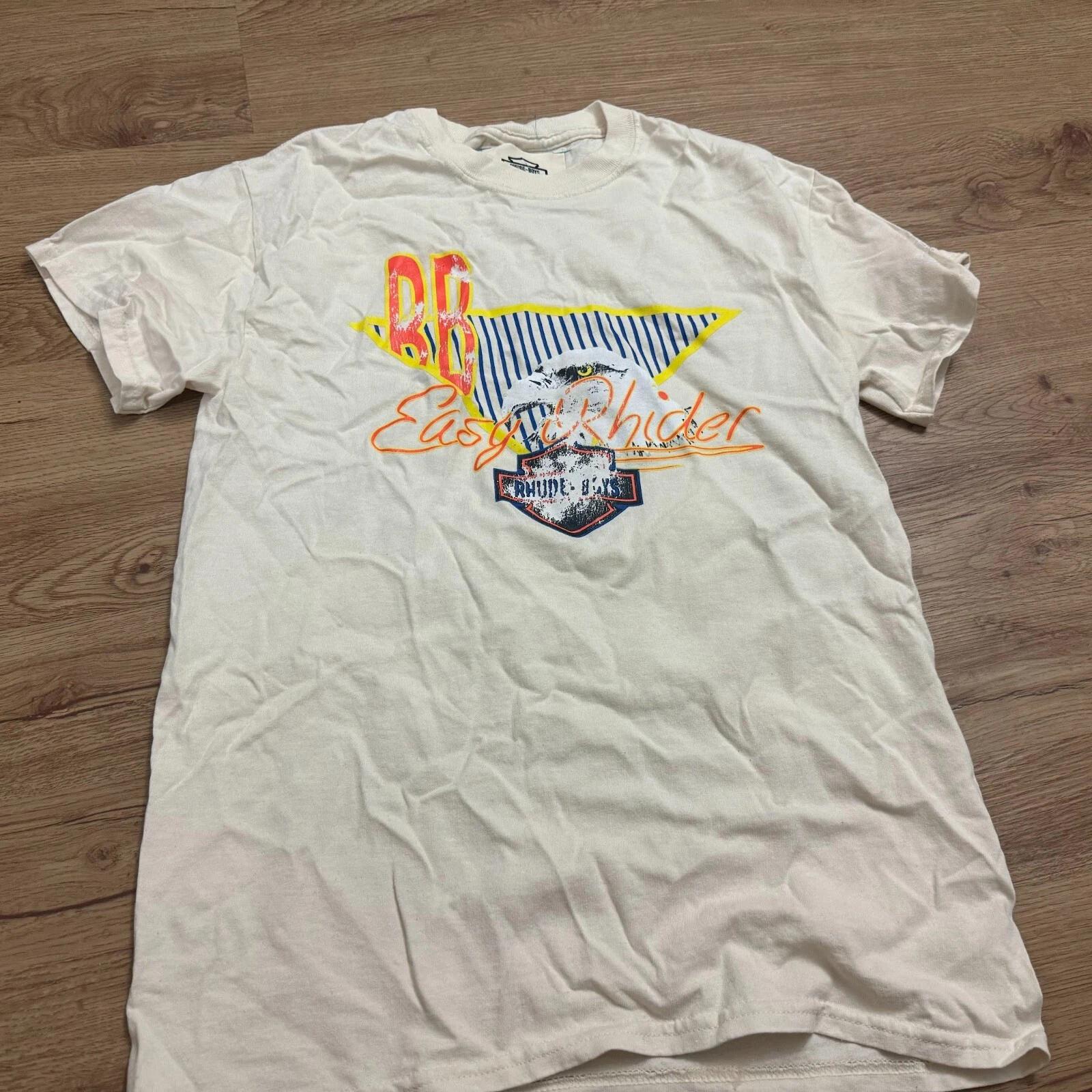 New Rhude Boys Off White Beige Eagle Easy Rider Rhider T-Shirt Size Small S Fade XL
New Rhude Boys Off White Beige Eagle Easy Rider Rhider T-Shirt Size Small S Fade XL