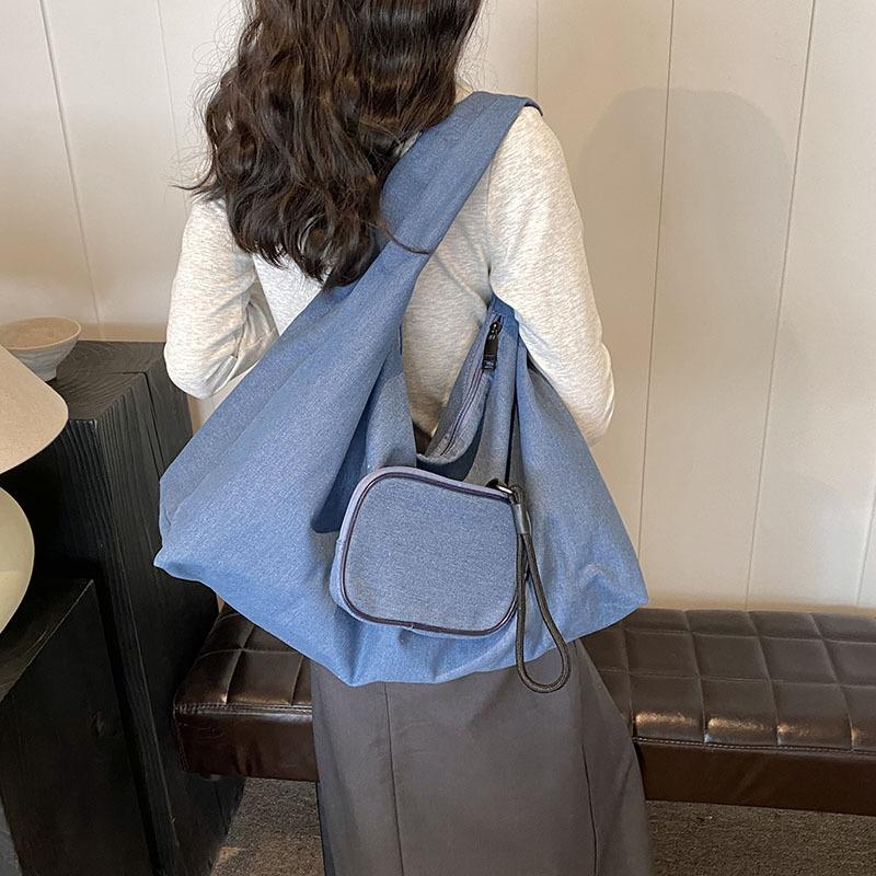 Korean version of casual canvas bag bag large capacity women s armpit bag 2025 new simple shoulder tote bag one piece hair синий
Korean version of casual canvas bag bag large capacity women s armpit bag 2025 new simple shoulder tote bag one piece hair синий
