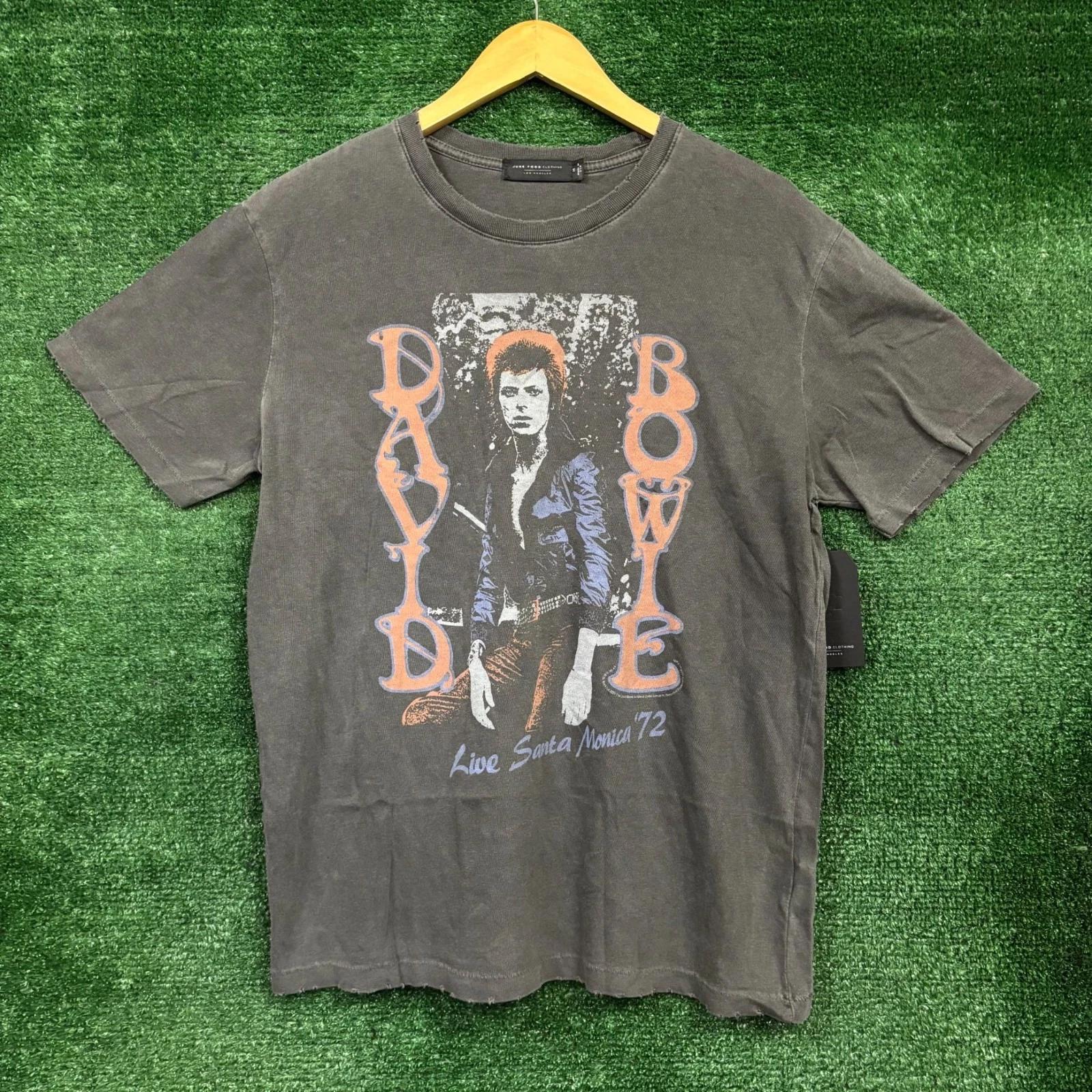 David Bowie Live Santa Monica 72 Rock T-shirt Size Medium 2XL
David Bowie Live Santa Monica 72 Rock T-shirt Size Medium 2XL