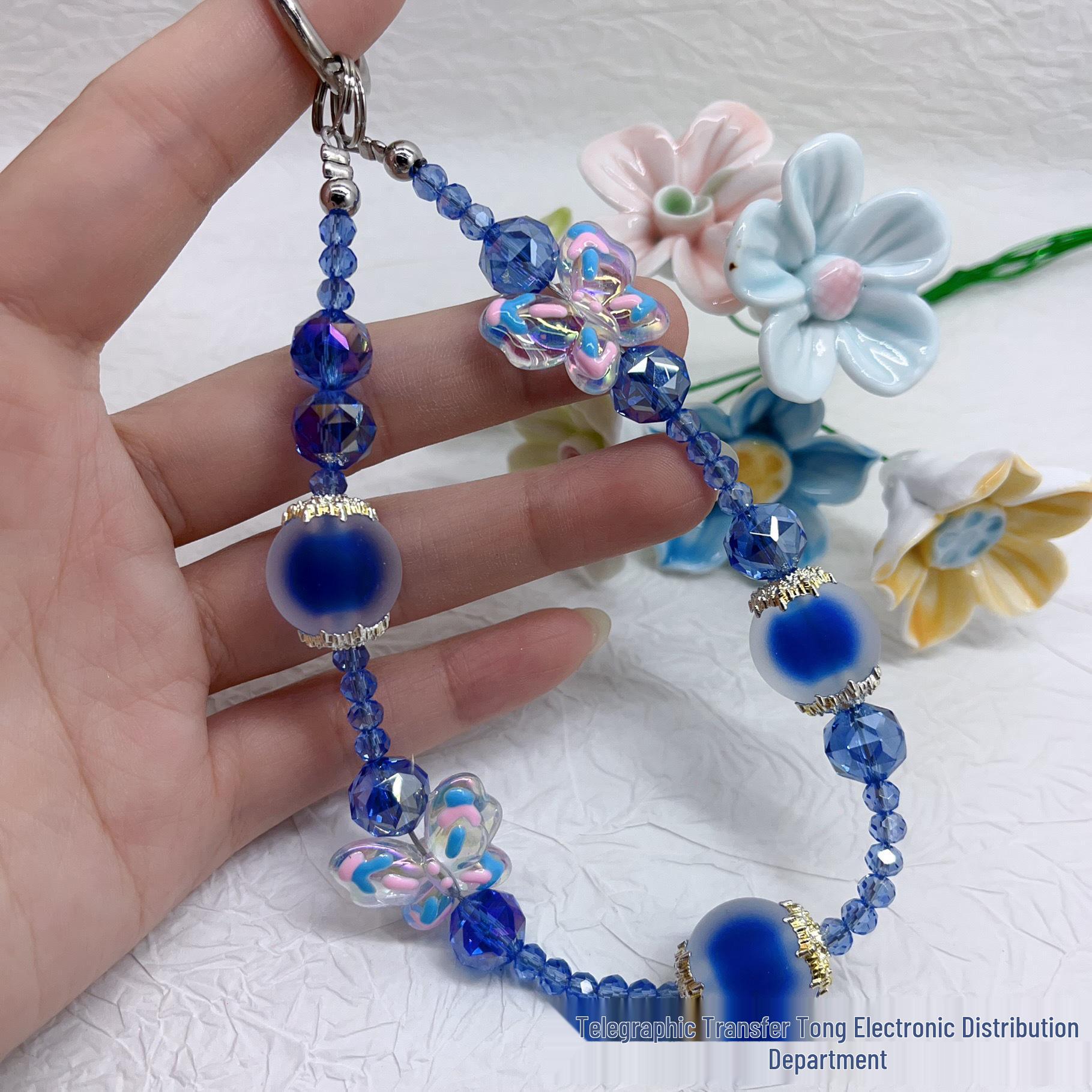 Colorful Butterfly Acrylic Bead Phone Wristlet with Flower Crystals
Colorful Butterfly Acrylic Bead Phone Wristlet with Flower Crystals