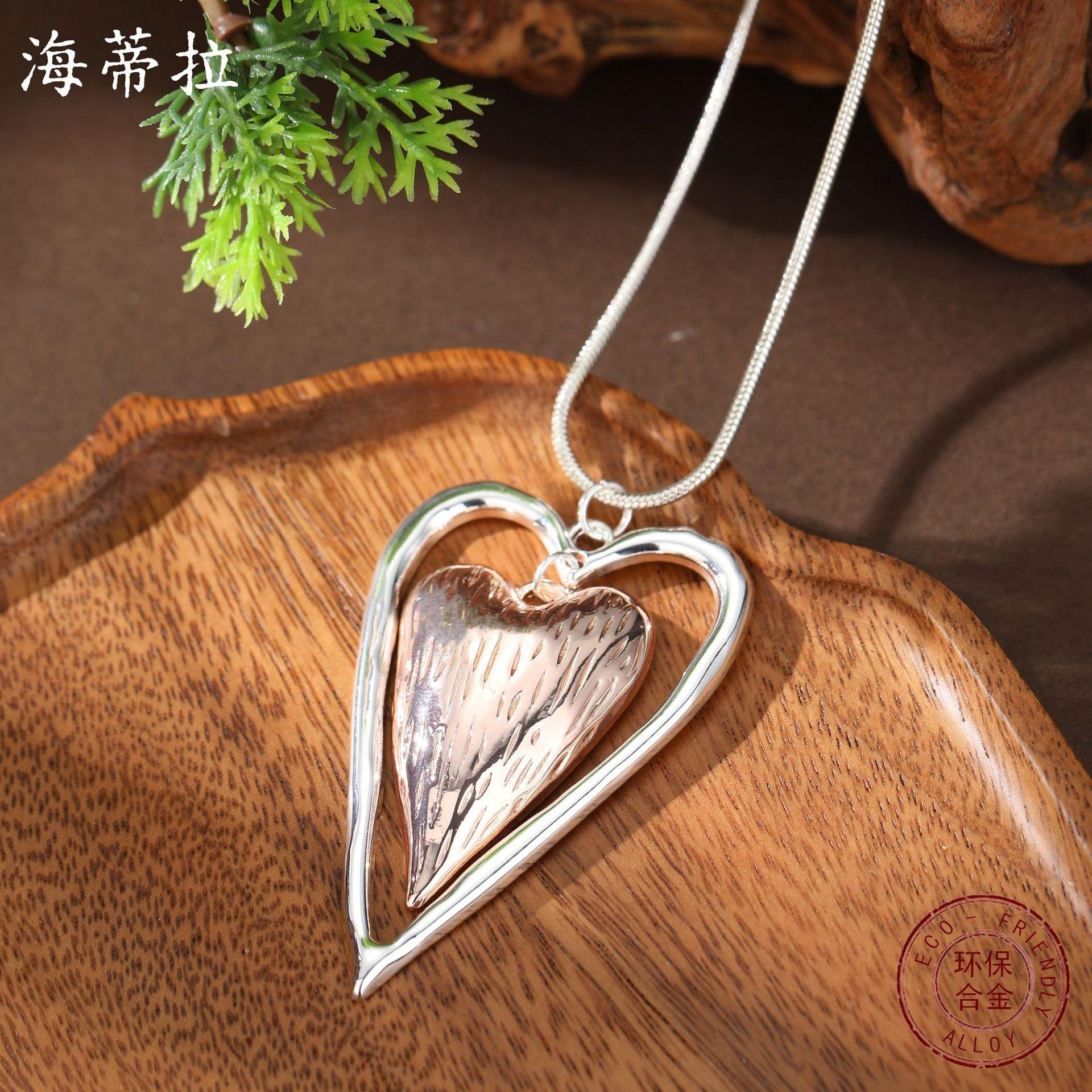 Glossy hollow love snake bone chain long pendant, women s simple high-end heart-shaped long necklace
Glossy hollow love snake bone chain long pendant, women s simple high-end heart-shaped long necklace