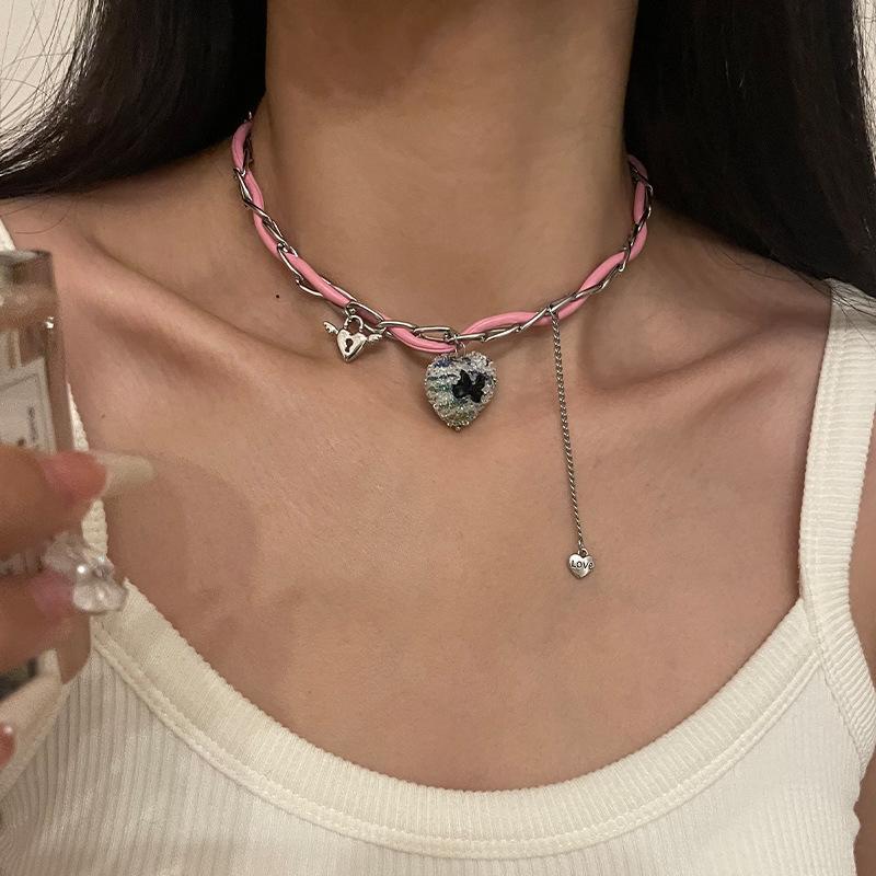 Pink leather braided heart necklace - unique y2k style for the edgy girl
Pink leather braided heart necklace - unique y2k style for the edgy girl