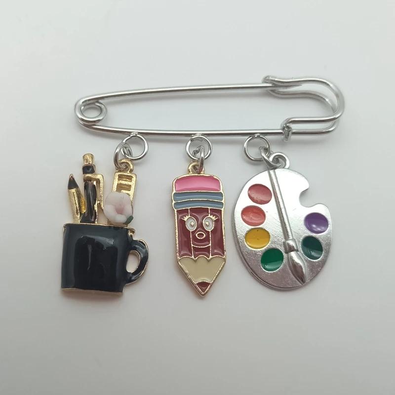 Silver Tone Art Student Brooch - Artist Safety Pin with Palette & Paintbrush Charms, Teacher Jewelry Gift Style 9
Silver Tone Art Student Brooch - Artist Safety Pin with Palette & Paintbrush Charms, Teacher Jewelry Gift Style 9