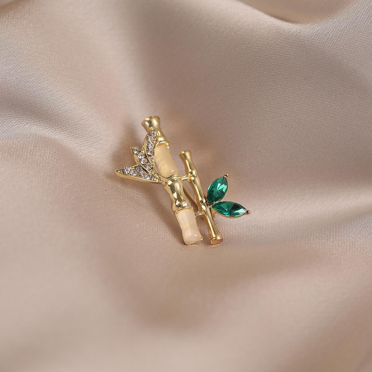 Bamboo brooch, high-end sense, light luxury, high-end women s niche design, exquisite and versatile suit pin, trendy temperament
Bamboo brooch, high-end sense, light luxury, high-end women s niche design, exquisite and versatile suit pin, trendy temperament