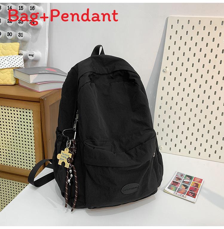 Minimalist Solid Color Backpack For Women And Men With Durable Nylon Material Suitable For Casual Travel And School Use чёрный
Minimalist Solid Color Backpack For Women And Men With Durable Nylon Material Suitable For Casual Travel And School Use чёрный