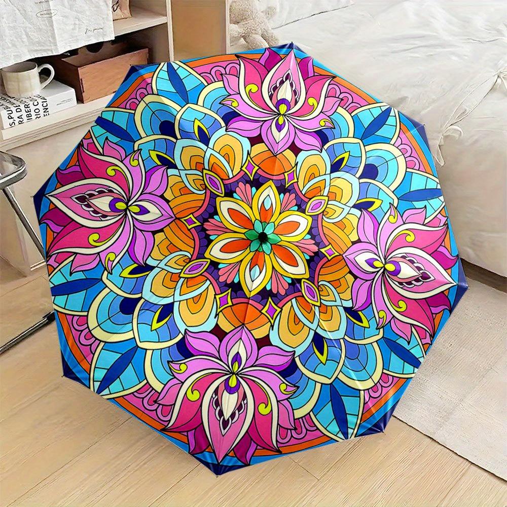 A Colorful Mandala Featuring Floral Designs. This Is a Compact, Foldable Umbrella, Perfect for Casual Outings And Makes a Grea
A Colorful Mandala Featuring Floral Designs. This Is a Compact, Foldable Umbrella, Perfect for Casual Outings And Makes a Grea