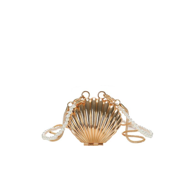 Cute new metal personalized scallop special-shaped women s change bag Japanese and Korean exquisite shoulder messenger bag золотий
Cute new metal personalized scallop special-shaped women s change bag Japanese and Korean exquisite shoulder messenger bag золотий