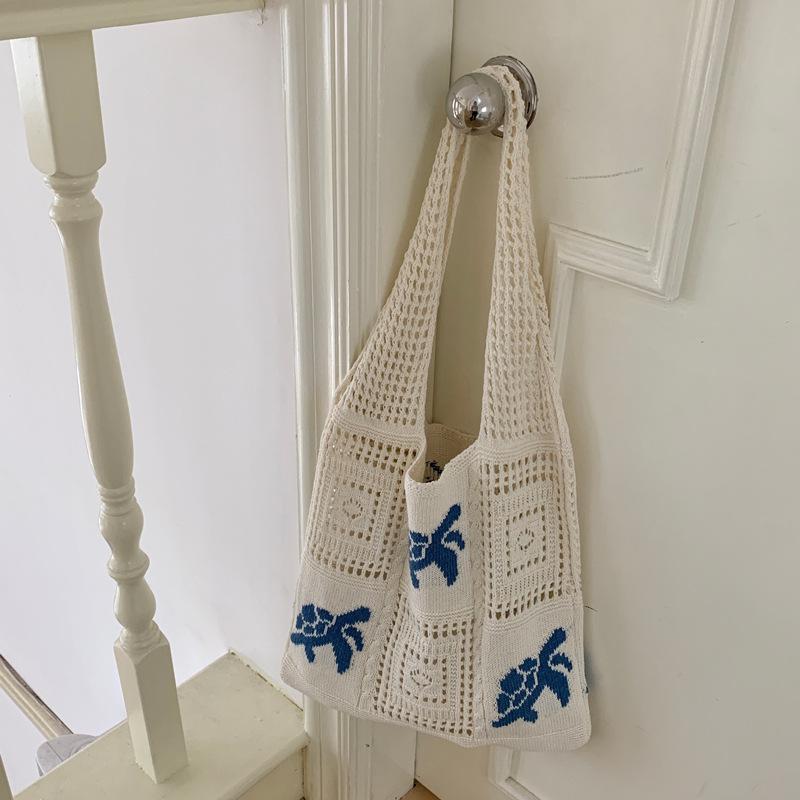 SHEIN Retro Hollow-Out Knit Travel Shoulder Bag - Large Capacity Niche Design
SHEIN Retro Hollow-Out Knit Travel Shoulder Bag - Large Capacity Niche Design