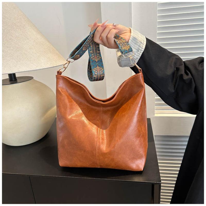 Retro commuter large-capacity women s new simple casual tote bag fashionable shoulder bag dry bar leather bucket bag коричневый
Retro commuter large-capacity women s new simple casual tote bag fashionable shoulder bag dry bar leather bucket bag коричневый