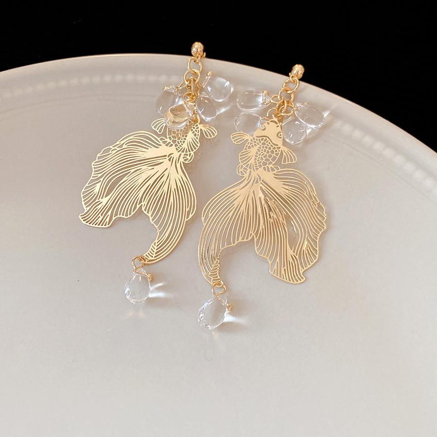Silver needle new Chinese retro koi earrings light luxury high-end stud earrings fashion temperament niche simple earrings
Silver needle new Chinese retro koi earrings light luxury high-end stud earrings fashion temperament niche simple earrings