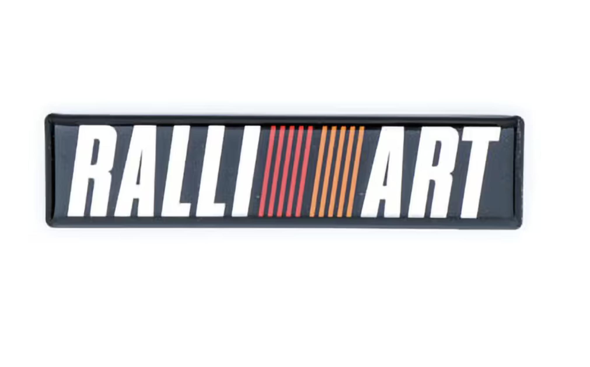 Genuine MITSUBISHI OEM LANCER CY4A 2005 Rear Ralliart Mark Emblem 7415A033 
Genuine MITSUBISHI OEM LANCER CY4A 2005 Rear Ralliart Mark Emblem 7415A033