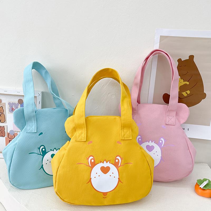 Аниме Периферийный уход Медведь Радужный медведь Холст Сумки Kawaii Сумка на плечо Сумка Большая емкость Сумочка Пары Дети Подарки
Аниме Периферийный уход Медведь Радужный медведь Холст Сумки Kawaii Сумка на плечо Сумка Большая емкость Сумочка Пары Дети Подарки