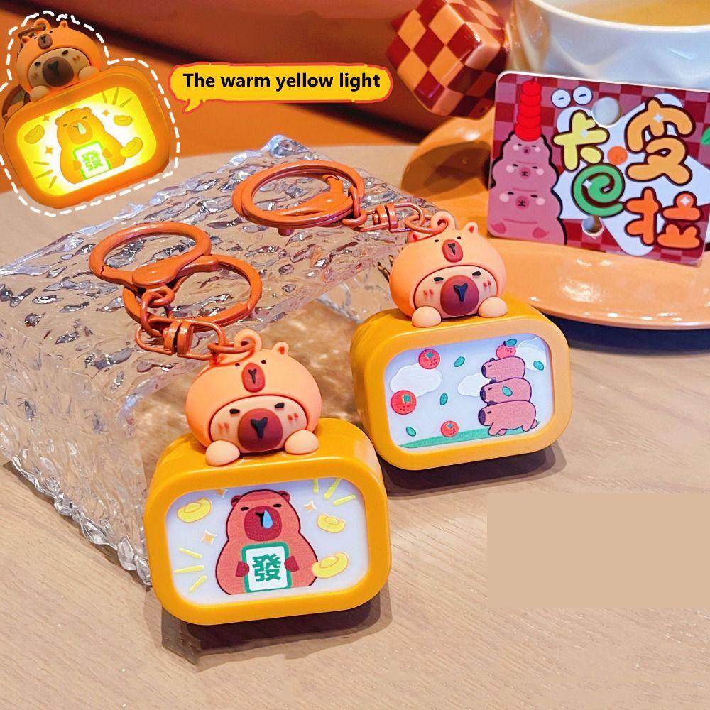 Cartoon Flashing Light Keyring Glow Light-emitting Television Pendant Car Keychain brown
Cartoon Flashing Light Keyring Glow Light-emitting Television Pendant Car Keychain brown