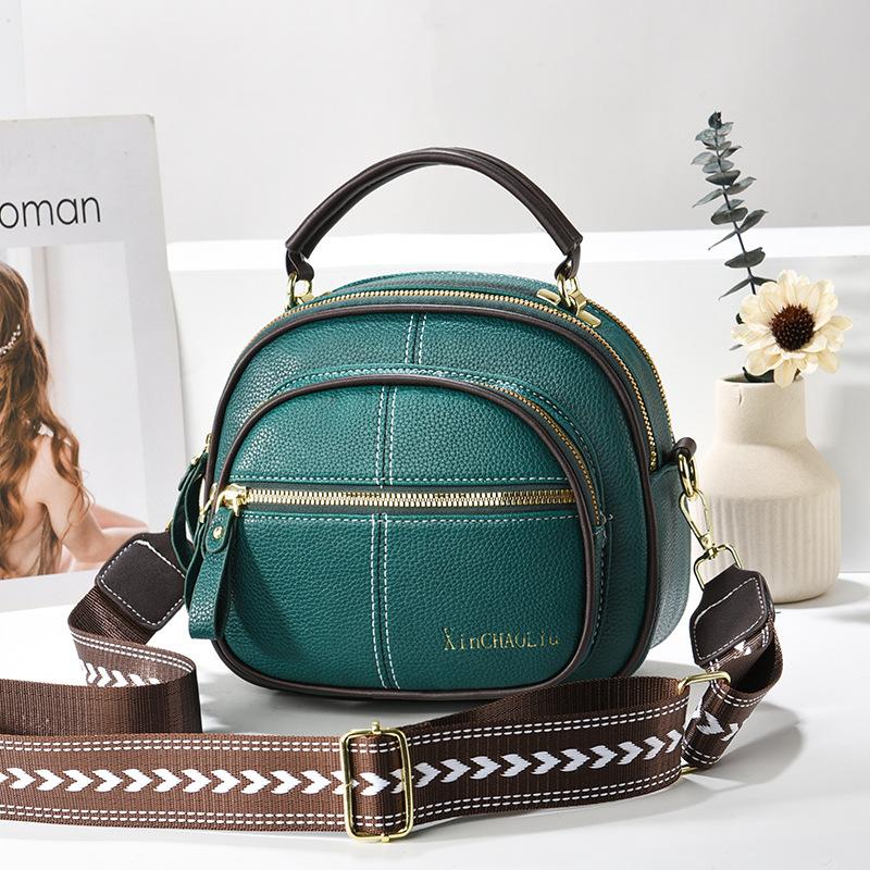 New simple multi-layer small round bag versatile casual handbag shoulder bag messenger bag small bag 21*13*18
New simple multi-layer small round bag versatile casual handbag shoulder bag messenger bag small bag 21*13*18
