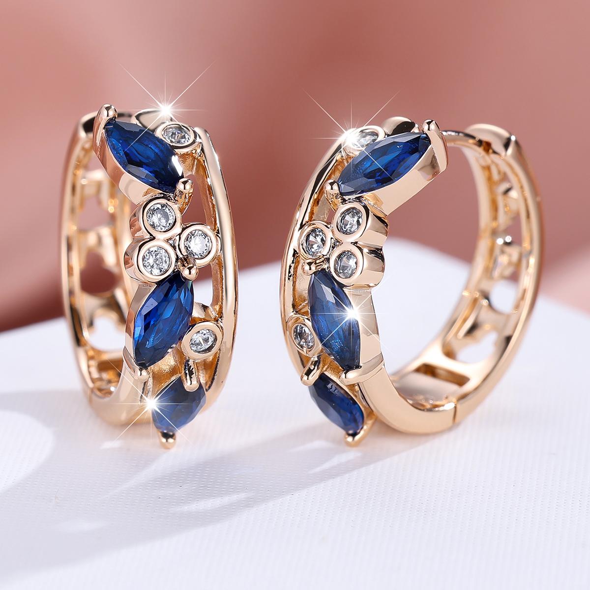 Нове модне літнє шампанське, золото, циркон, кінське око, пряжка з порожнистими вухами, свіжі та елегантні жіночі ювелірні сережки синій
Нове модне літнє шампанське, золото, циркон, кінське око, пряжка з порожнистими вухами, свіжі та елегантні жіночі ювелірні сережки синій