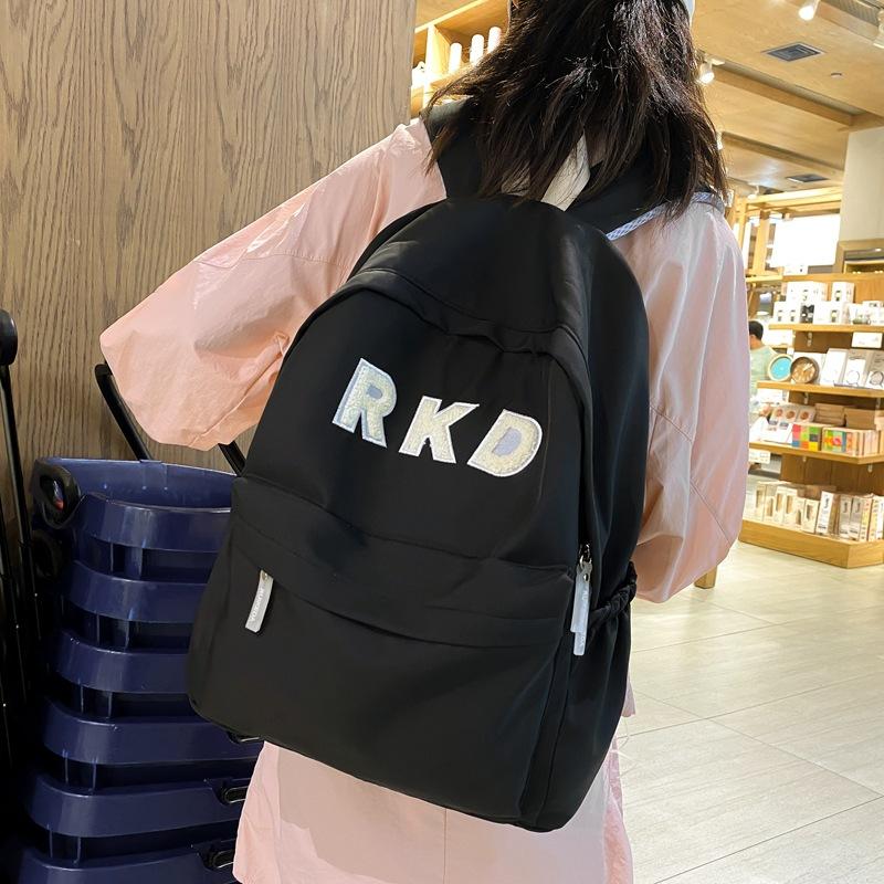 Simple and stylish nylon backpack new large-capacity junior high school student schoolbag backpack female чорний
Simple and stylish nylon backpack new large-capacity junior high school student schoolbag backpack female чорний