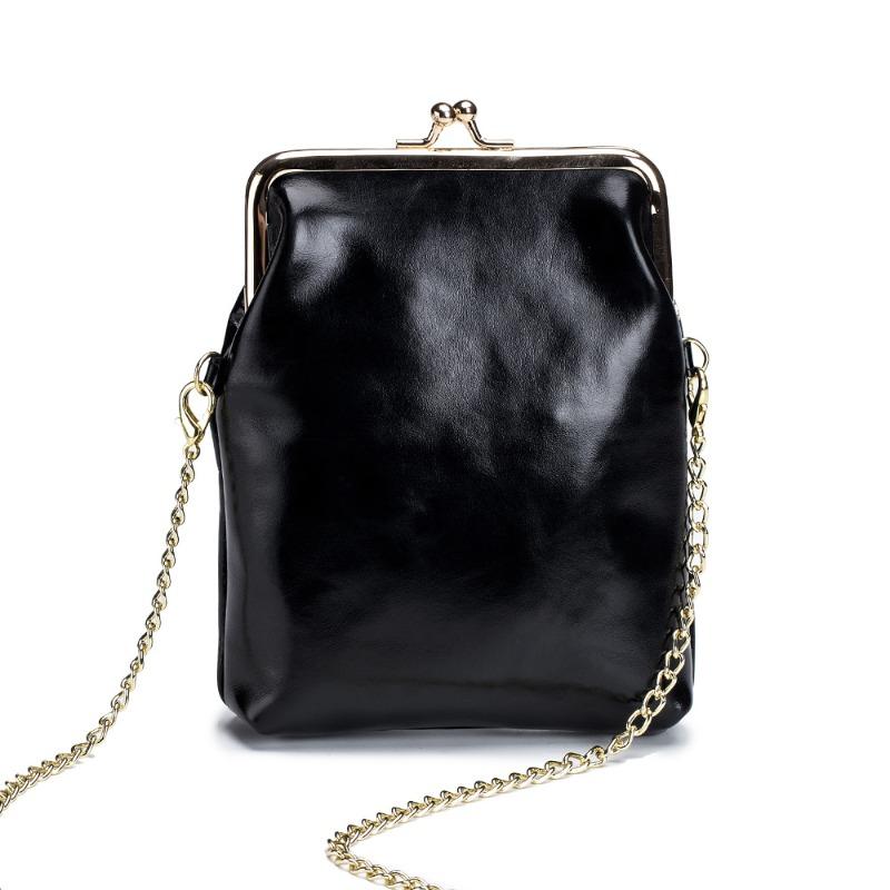 Leather fashion retro mobile phone bag niche ladies, shoulder chain messenger bag ins mini clip small bag чорний
Leather fashion retro mobile phone bag niche ladies, shoulder chain messenger bag ins mini clip small bag чорний
