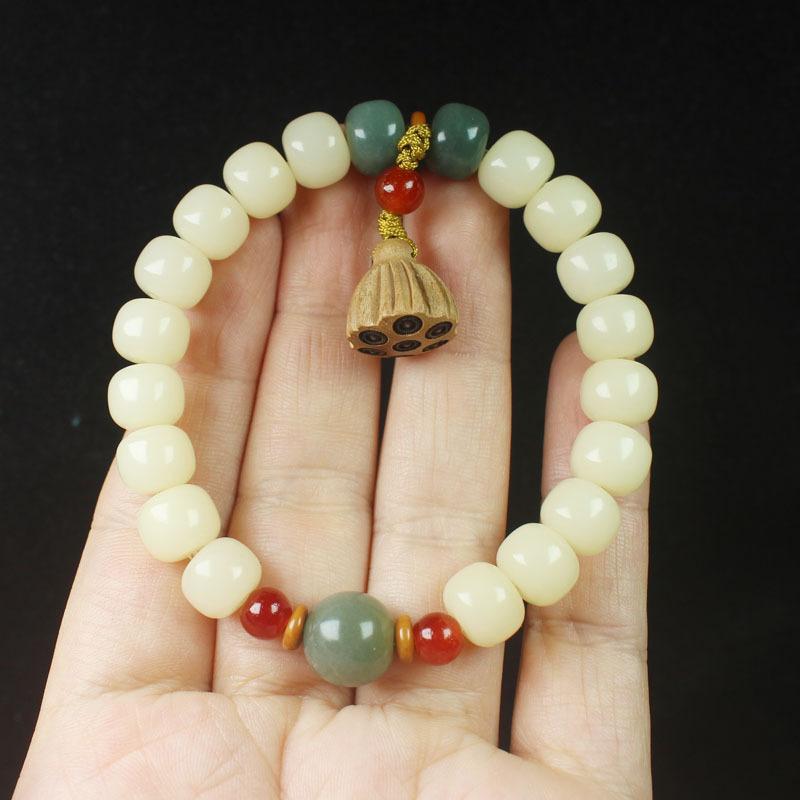 Jade Creamy Yellow Bodhi Root Barrel Bead Bracelet with Lotus Pod Pendant Unisex Chinese Style Wooden Hand Decoration Jewelry
Jade Creamy Yellow Bodhi Root Barrel Bead Bracelet with Lotus Pod Pendant Unisex Chinese Style Wooden Hand Decoration Jewelry