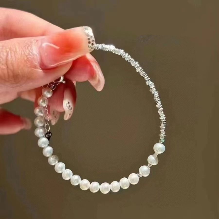 Freshwater pearl broken silver bracelet female niche simple and versatile hand ornament natural pearl bracelet is adjustable білий
Freshwater pearl broken silver bracelet female niche simple and versatile hand ornament natural pearl bracelet is adjustable білий