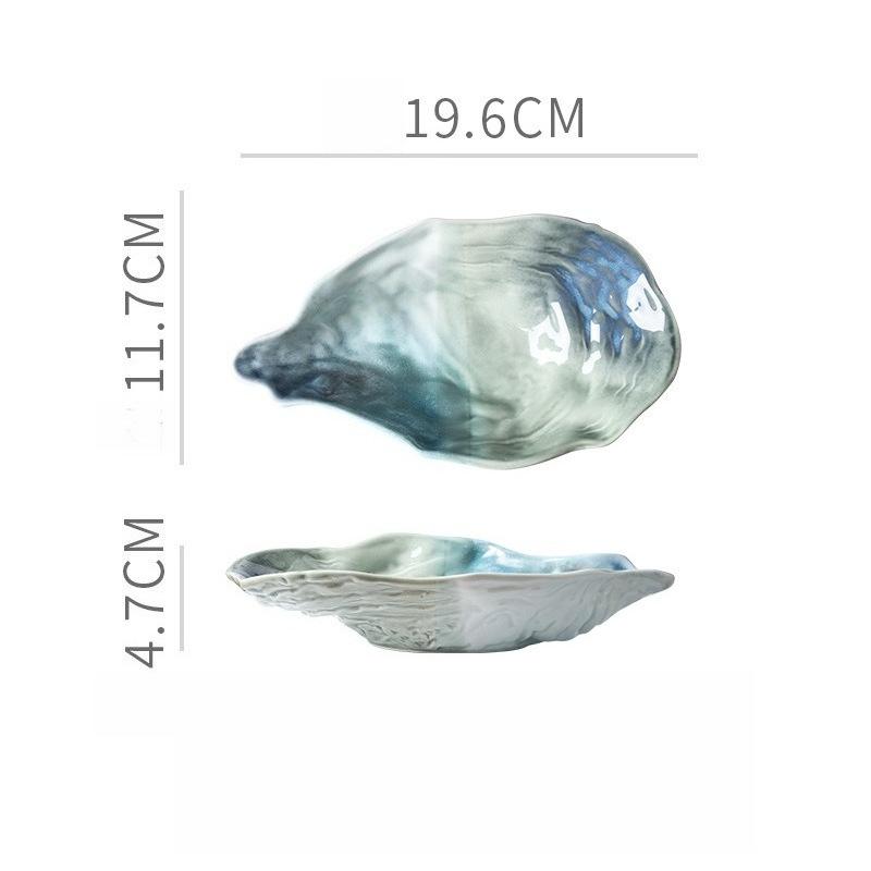 Japanese Kiln Style Ceramic Flavor Dish Personalized Restaurant Hotel Oyster Shaped High-value Dessert Dipping Sauce Dish
Japanese Kiln Style Ceramic Flavor Dish Personalized Restaurant Hotel Oyster Shaped High-value Dessert Dipping Sauce Dish