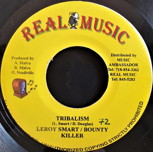 7inch Record LEROY SMART / BOUNTY KILLER - Tribalism NONE Real Music 2003 Jamaica Reggae, Ska & Dub Used
7inch Record LEROY SMART / BOUNTY KILLER - Tribalism NONE Real Music 2003 Jamaica Reggae, Ska & Dub Used