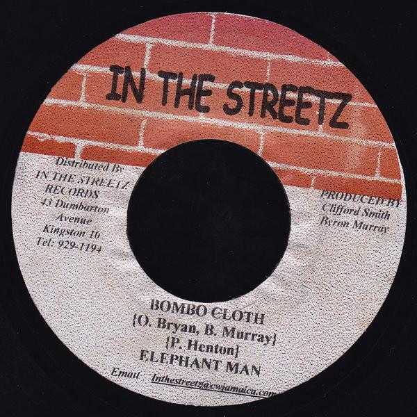 7inch Record ELEPHANT MAN / NITTY KUTCHIE - Bombo Cloth / Cha La La La NONE In The Streetz 2001 Jamaica Reggae, Ska & Dub Used
7inch Record ELEPHANT MAN / NITTY KUTCHIE - Bombo Cloth / Cha La La La NONE In The Streetz 2001 Jamaica Reggae, Ska & Dub Used