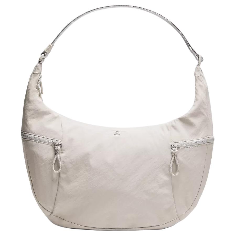 Lululemon 13L Silver Brand Metal Logo Nylon Shoulder Bag Large Unisex Shoulder Bag White LU9CADS-072762 Ivory White
Lululemon 13L Silver Brand Metal Logo Nylon Shoulder Bag Large Unisex Shoulder Bag White LU9CADS-072762 Ivory White