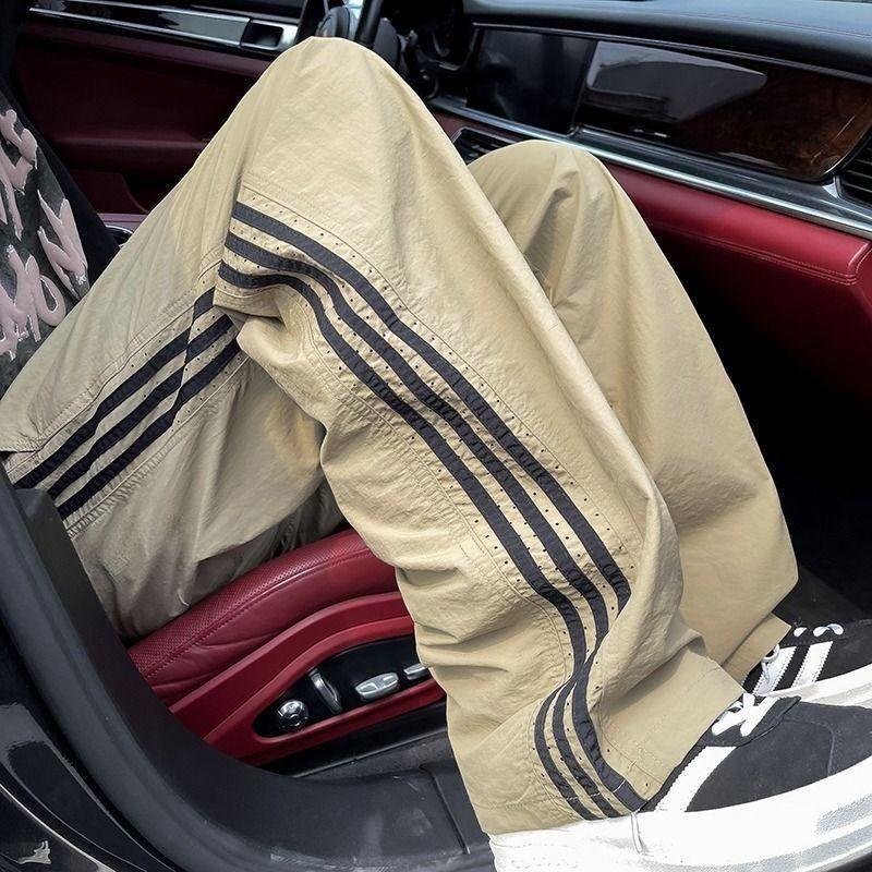 Универсальные американские брюки с тремя шлевками для мужского лета, тонкие, свободные, прямого кроя, спортивные повседневные брюки 3XL
Универсальные американские брюки с тремя шлевками для мужского лета, тонкие, свободные, прямого кроя, спортивные повседневные брюки 3XL