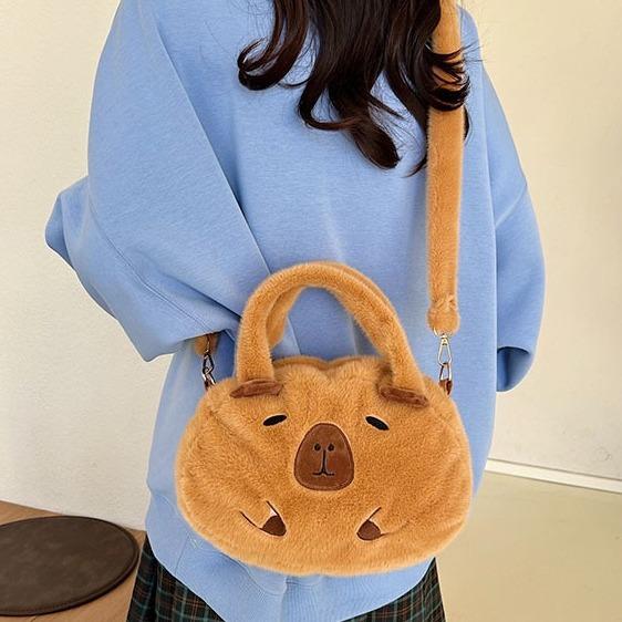 Water guinea pig doll plush cartoon double shoulder schoolbag girls cute gift messenger round bag
Water guinea pig doll plush cartoon double shoulder schoolbag girls cute gift messenger round bag