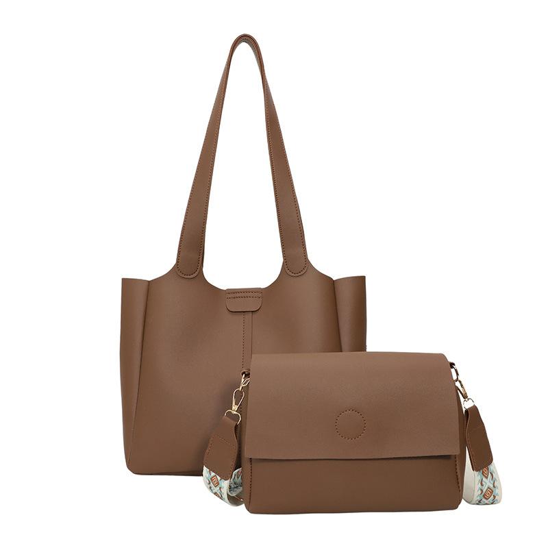 Versatile women s bag new niche design, Versatile mother and child bag simple and fashionable messenger tote bag коричневий
Versatile women s bag new niche design, Versatile mother and child bag simple and fashionable messenger tote bag коричневий