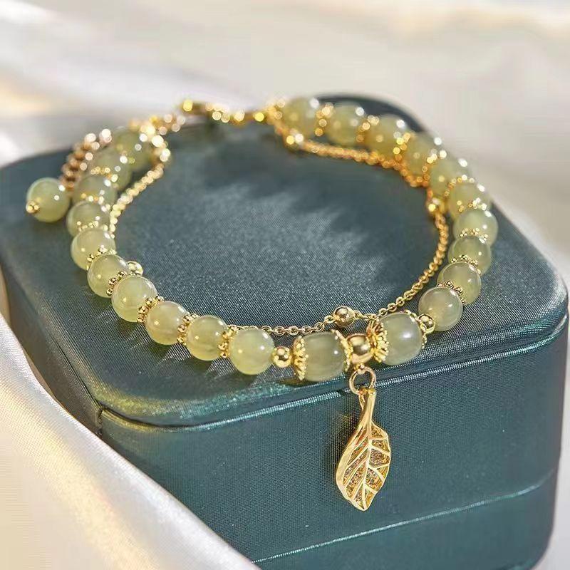 Golden Branch Jade Leaf Double Layer Women s Bracelet - Summer Light Luxury, Fresh Design 2022.
Golden Branch Jade Leaf Double Layer Women s Bracelet - Summer Light Luxury, Fresh Design 2022.