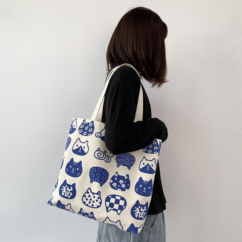 New Cat Canvas Bag Female Single Shoulder Cute Versatile Large-capacity Student Travel Bag
New Cat Canvas Bag Female Single Shoulder Cute Versatile Large-capacity Student Travel Bag