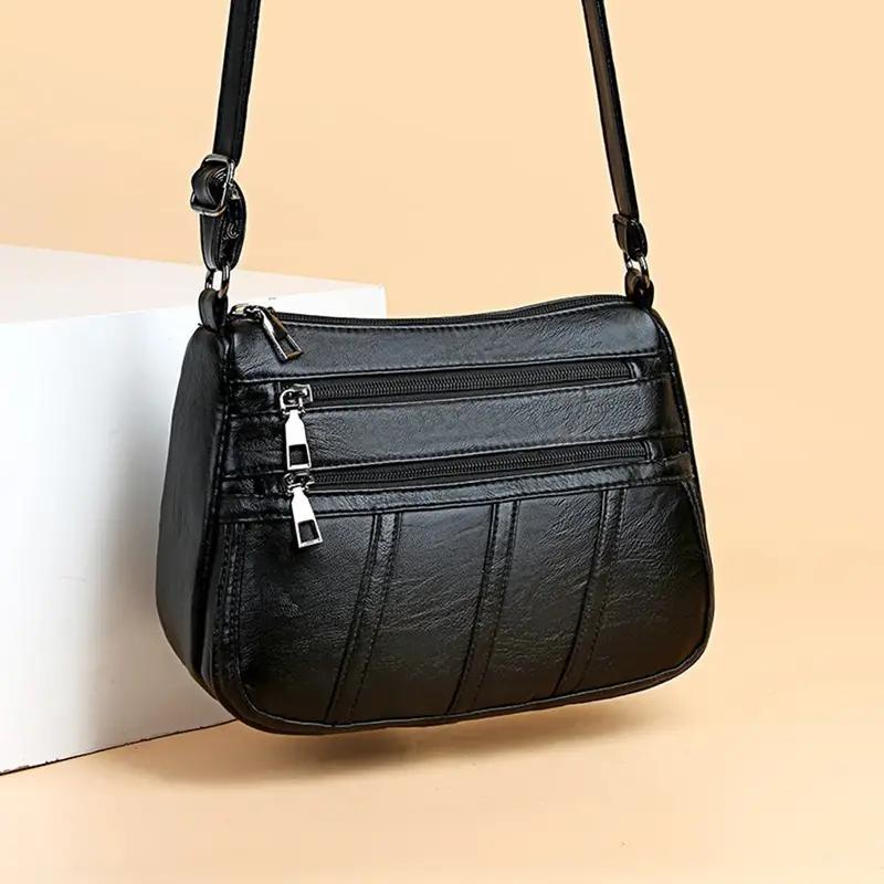 Классическая молния Crossbody Bag Женская мода Искусственная кожа Сумка для плеча с регулируемым ремешком
Классическая молния Crossbody Bag Женская мода Искусственная кожа Сумка для плеча с регулируемым ремешком