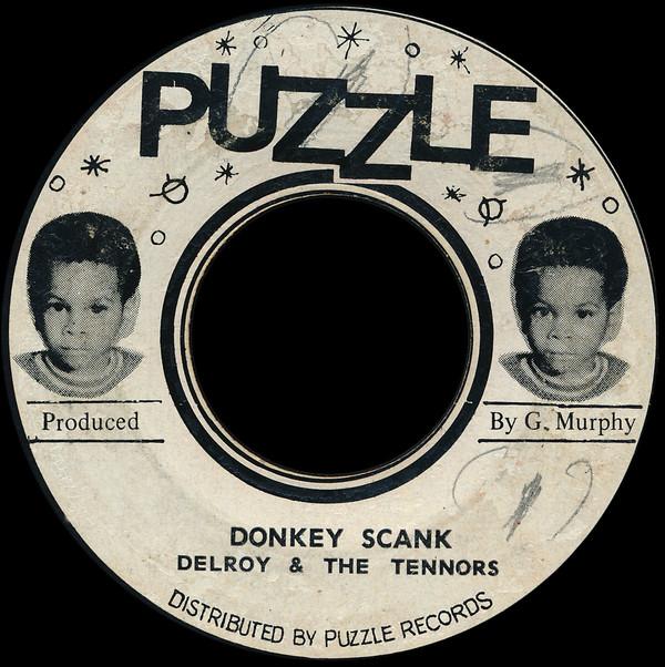 7inch Record DELROY CRUTCHES JONES THE TENNO Donkey Scank NONE Puzzle 1971 Jamaica Reggae Ska Dub Used
7inch Record DELROY CRUTCHES JONES THE TENNO Donkey Scank NONE Puzzle 1971 Jamaica Reggae Ska Dub Used