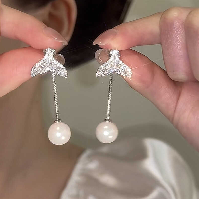 Fishtail pearl fringed earrings fashion unique design stud earrings high sense personality niche earrings women
Fishtail pearl fringed earrings fashion unique design stud earrings high sense personality niche earrings women