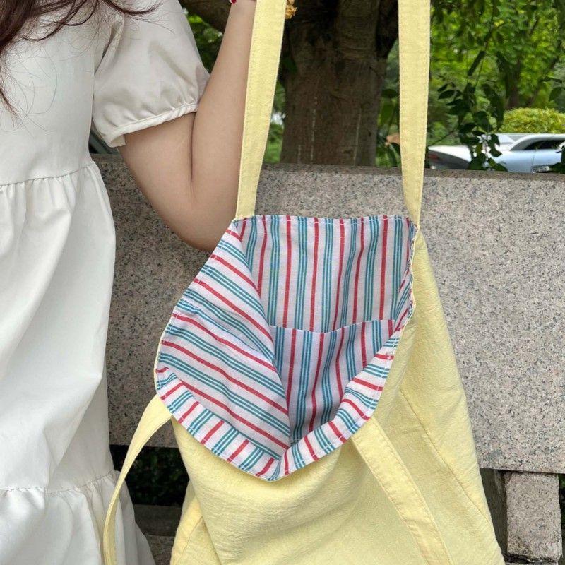 2025 New Korean Series Yellow Pear Canvas Bag Fresh All-Match Shoulder Bag Niche Design Stripe Lining Handbags Light yellow
2025 New Korean Series Yellow Pear Canvas Bag Fresh All-Match Shoulder Bag Niche Design Stripe Lining Handbags Light yellow