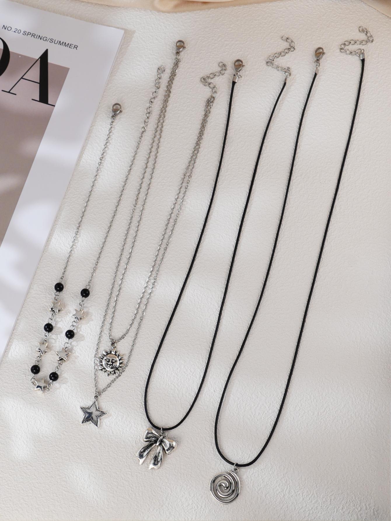 4pcs Gothic Silver Layered stainless steel Necklace Set, Black Bead, Sun Star & Bow Pendant, Charm Jewelry for Women
4pcs Gothic Silver Layered stainless steel Necklace Set, Black Bead, Sun Star & Bow Pendant, Charm Jewelry for Women