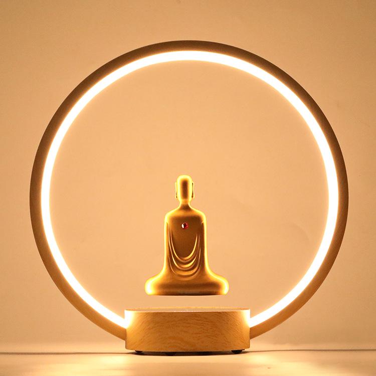 Gold-Plated Faceless Buddha Statue with LED Rotating Ring Lamp
Gold-Plated Faceless Buddha Statue with LED Rotating Ring Lamp
