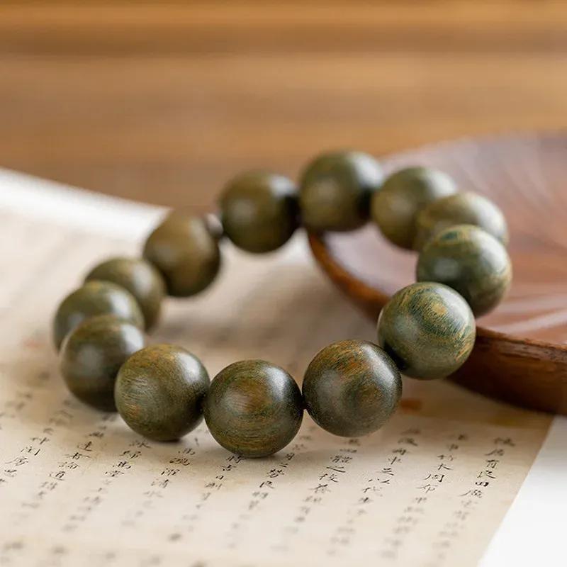 Green Sandalwood Bracelet Natural Wood Fragrance Lasting Hand-held Twisted Beads Men Female Couple Hand String Buddha Bead Yoga
Green Sandalwood Bracelet Natural Wood Fragrance Lasting Hand-held Twisted Beads Men Female Couple Hand String Buddha Bead Yoga