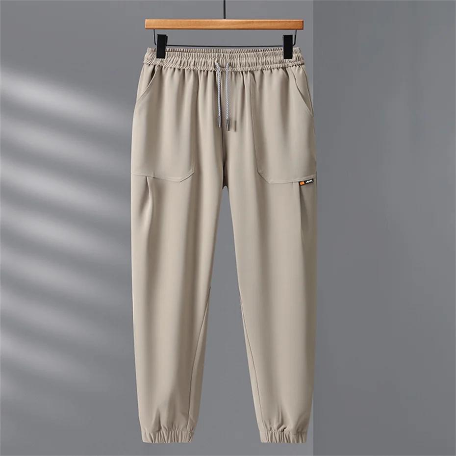 11XL 10XL Plus Size Jogger Pants Men Solid Color Cargo Pants Spring Summer Sweatpants Male Elastic Waist Trousers Big Size 11XL 11XL
11XL 10XL Plus Size Jogger Pants Men Solid Color Cargo Pants Spring Summer Sweatpants Male Elastic Waist Trousers Big Size 11XL 11XL
