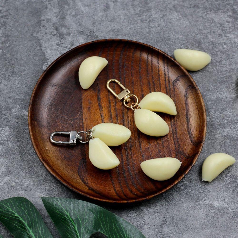Simulated Food Pendant Garlic Pendant Keychain Unique Simulated Food Cart Key Chain Unisex silver buckle
Simulated Food Pendant Garlic Pendant Keychain Unique Simulated Food Cart Key Chain Unisex silver buckle
