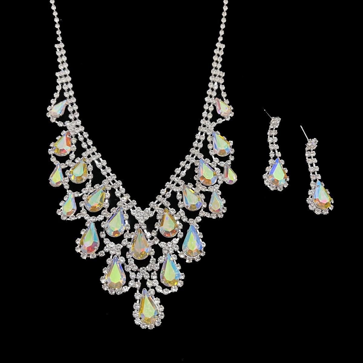 Модное хрустальное бриллиантовое ожерелье, серьги из двух частей, аксессуары для вечернего платья, ювелирные изделия для ужина, свадебные аксессуары для женщин
Модное хрустальное бриллиантовое ожерелье, серьги из двух частей, аксессуары для вечернего платья, ювелирные изделия для ужина, свадебные аксессуары для женщин