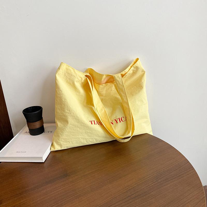 Large-capacity nylon cloth bag solid color casual and versatile simple shoulder underarm bag beautiful hand-held women s bag жовтий
Large-capacity nylon cloth bag solid color casual and versatile simple shoulder underarm bag beautiful hand-held women s bag жовтий