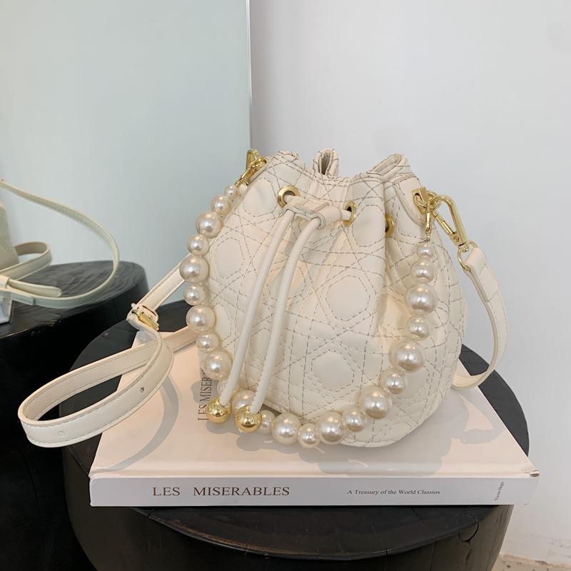 Niche pearl spring and summer bag women s new women s shoulder messenger bag embroidery thread bucket bag tide белый
Niche pearl spring and summer bag women s new women s shoulder messenger bag embroidery thread bucket bag tide белый
