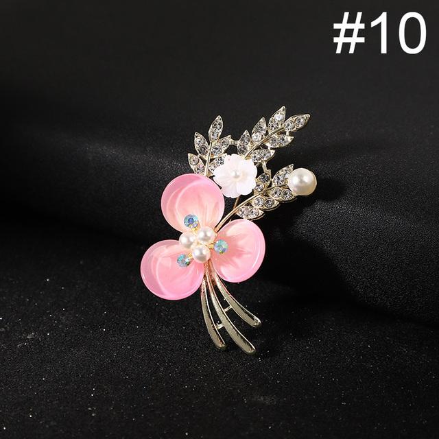 Броши в виде ракушек и жемчужных цветов для женщин, элегантная хрустальная брошь, булавка, свадебные украшения, высокое качество, корсаж, ювелирные аксессуары
Броши в виде ракушек и жемчужных цветов для женщин, элегантная хрустальная брошь, булавка, свадебные украшения, высокое качество, корсаж, ювелирные аксессуары