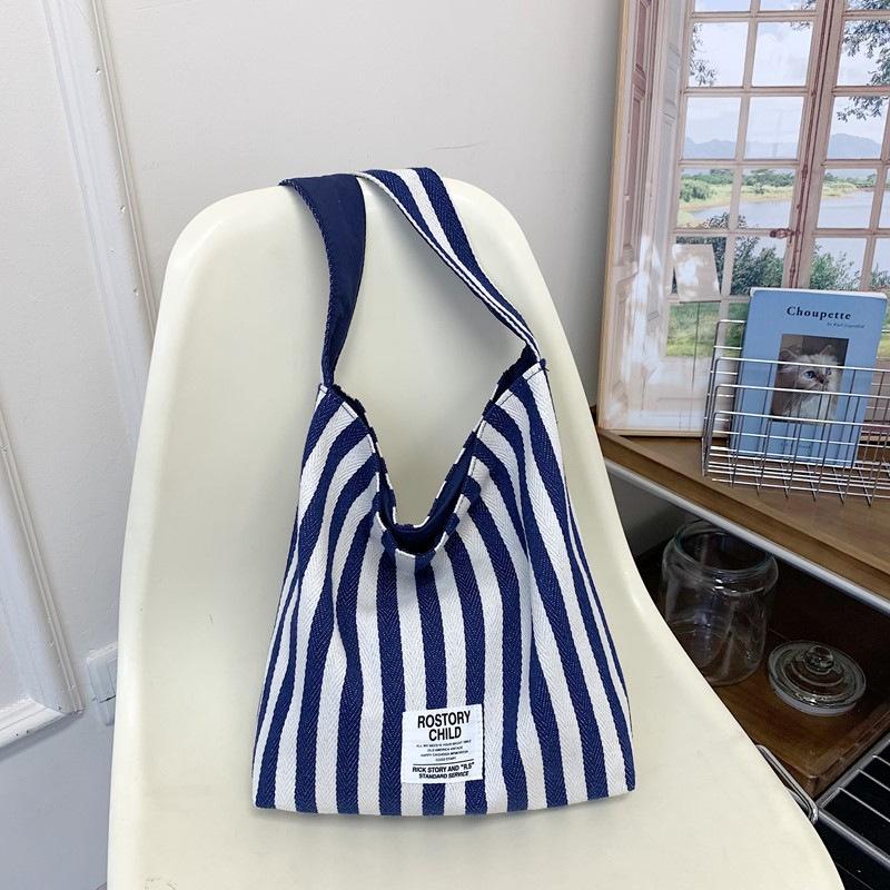 Полосатая двусторонняя сумка-тоут женская, в ленивом стиле, контрастного цвета, на плечо, большой вместимости, для отдыха, поездок на работу, универсальная плечевая
Полосатая двусторонняя сумка-тоут женская, в ленивом стиле, контрастного цвета, на плечо, большой вместимости, для отдыха, поездок на работу, универсальная плечевая