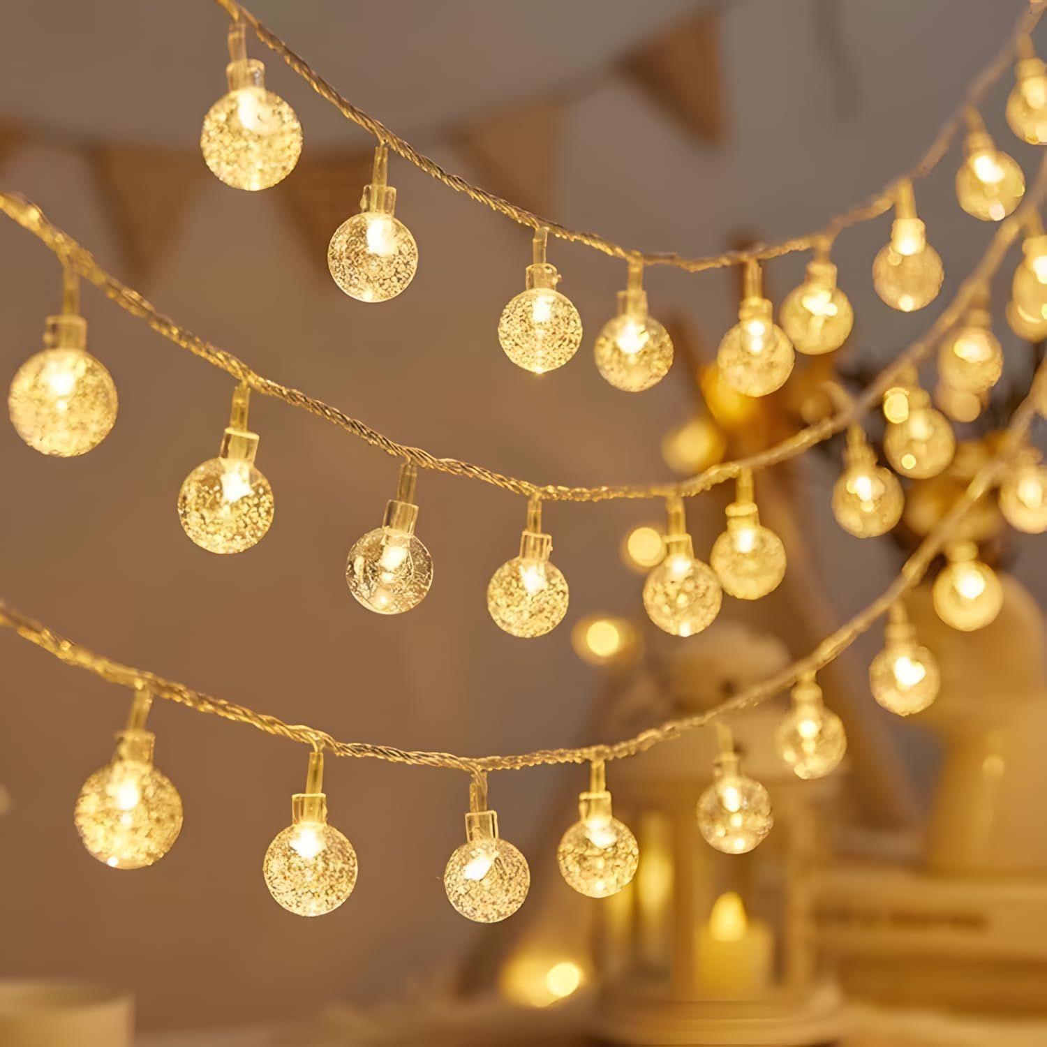 14 LED Crystal Ball String LED Diwali Lights for Decoration for Home 4 Mtr Warm White Waterproof Decorative Lights
14 LED Crystal Ball String LED Diwali Lights for Decoration for Home 4 Mtr Warm White Waterproof Decorative Lights