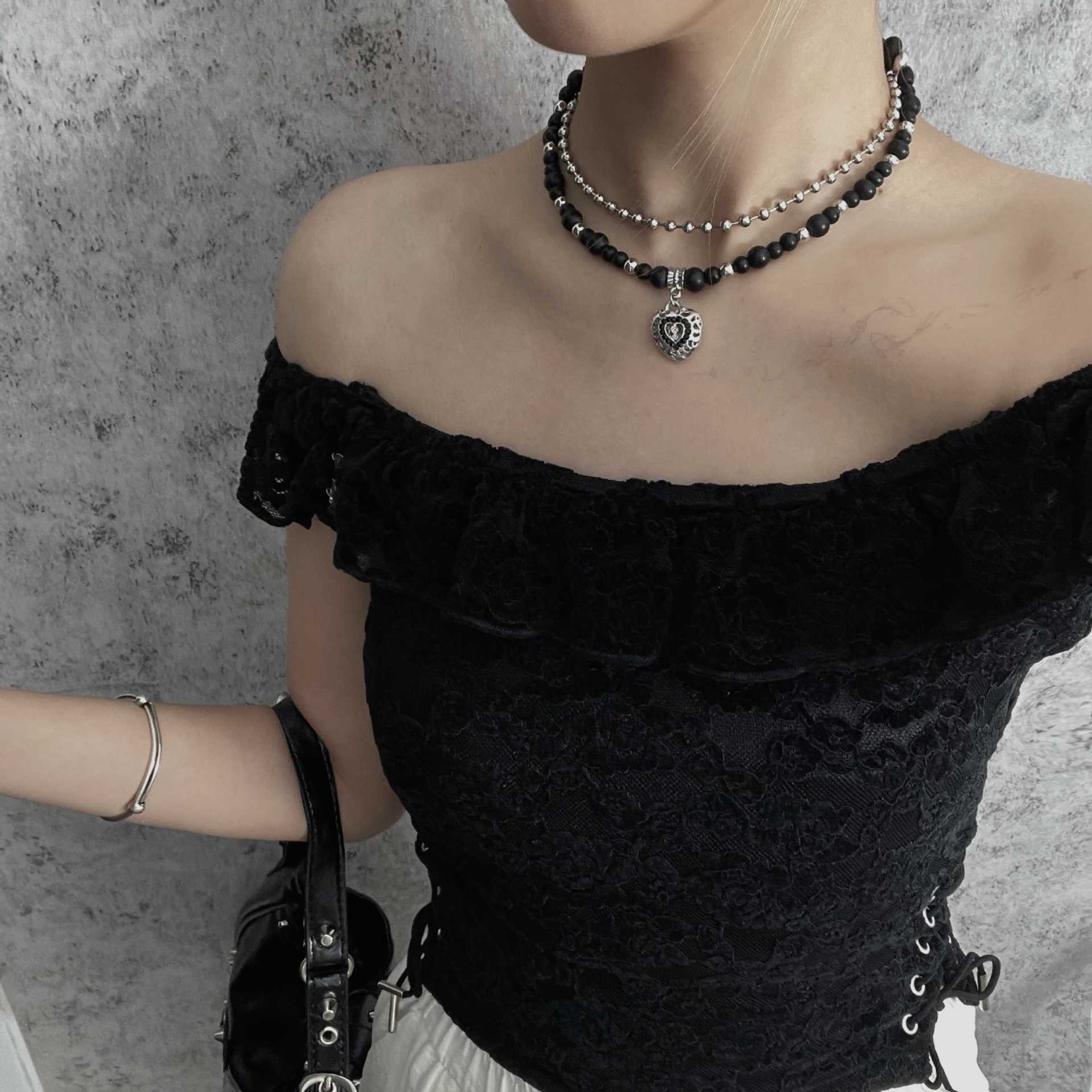 Temperament Charm Hollow Heart-shaped Pendant Silver Color Black Beaded Double Layer Wear Necklace for Women Designer Jewelry чорний
Temperament Charm Hollow Heart-shaped Pendant Silver Color Black Beaded Double Layer Wear Necklace for Women Designer Jewelry чорний