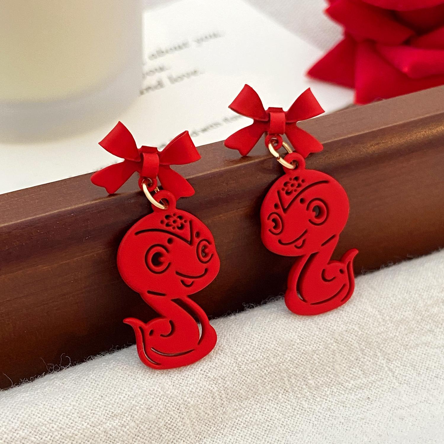 Серьги с красным бантом в виде змеи со знаком зодиака Новогодние серьги 1 pair
Серьги с красным бантом в виде змеи со знаком зодиака Новогодние серьги 1 pair